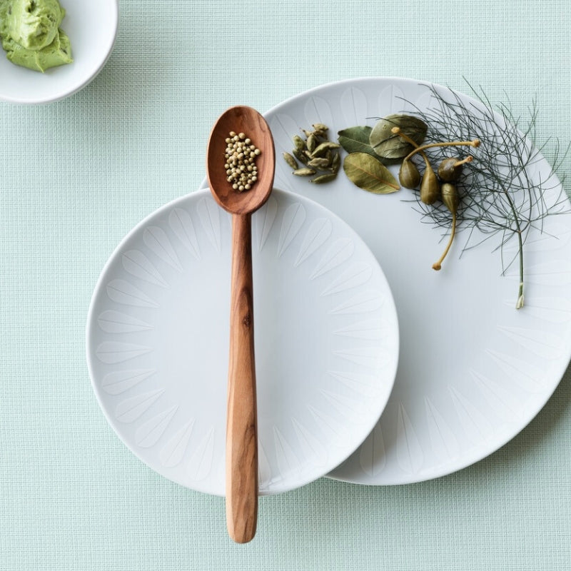 Elegant Lotus pattern servingware by Arne Clausen in white and grey. Bowls and plates included.